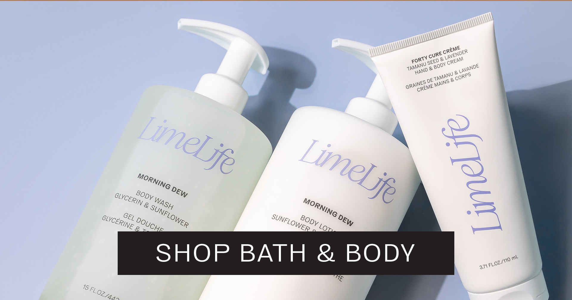 Three LimeLife bath and body products: Morning Dew body wash, body lotion, and Forty Cure Crème hand cream on blue background.