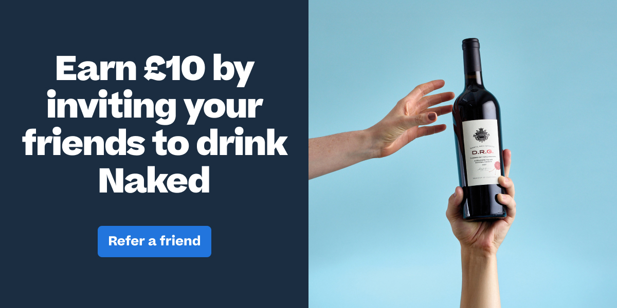 Alt text: "Two hands holding up a Naked wine bottle against a light blue background, referral promotion banner offering £10 reward"