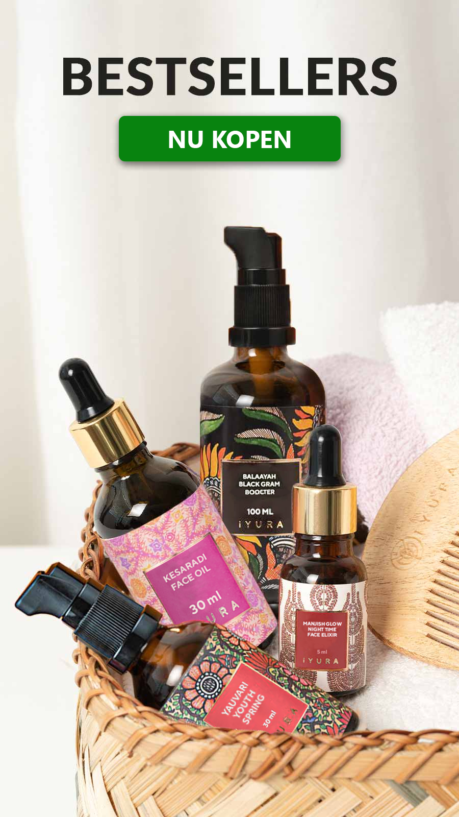Alt text: A basket containing various skincare products, including bottles labeled "Kesaradi Face Oil," "Balaayah Black Gram Booster," "Yauvari Youth Spring," and "Manjish Glow Night Time Face Elixir." The text above reads "Bestsellers" and "Nu Kopen" in Dutch.
