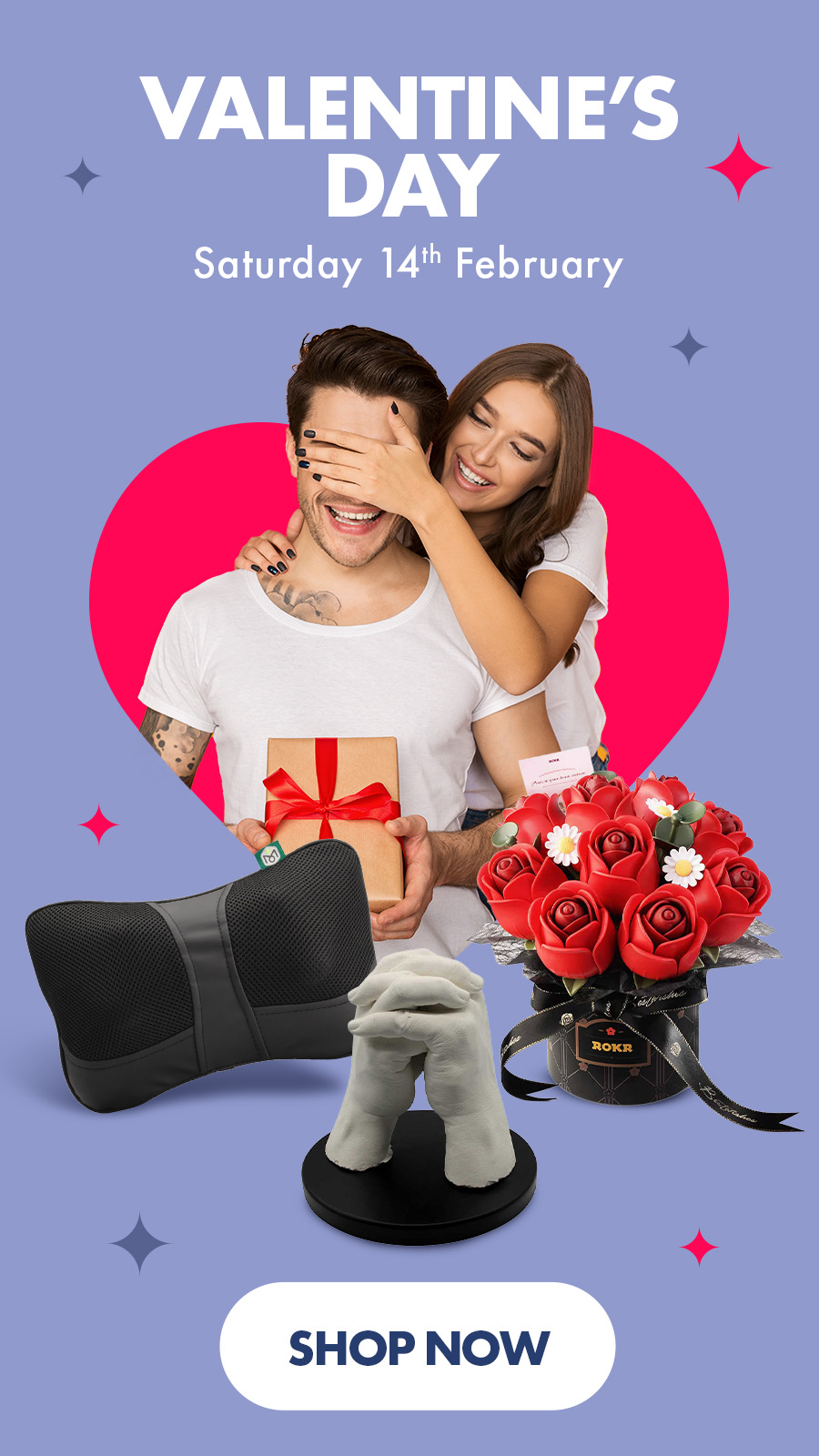 ```html
<img src="image-url" alt="Valentine's Day advertisement with a couple holding a gift box, surrounded by items like a neck pillow, bouquet of red roses, and hand sculpture. Text reads 'Valentine's Day, Saturday 14th February. Shop Now.'">
```