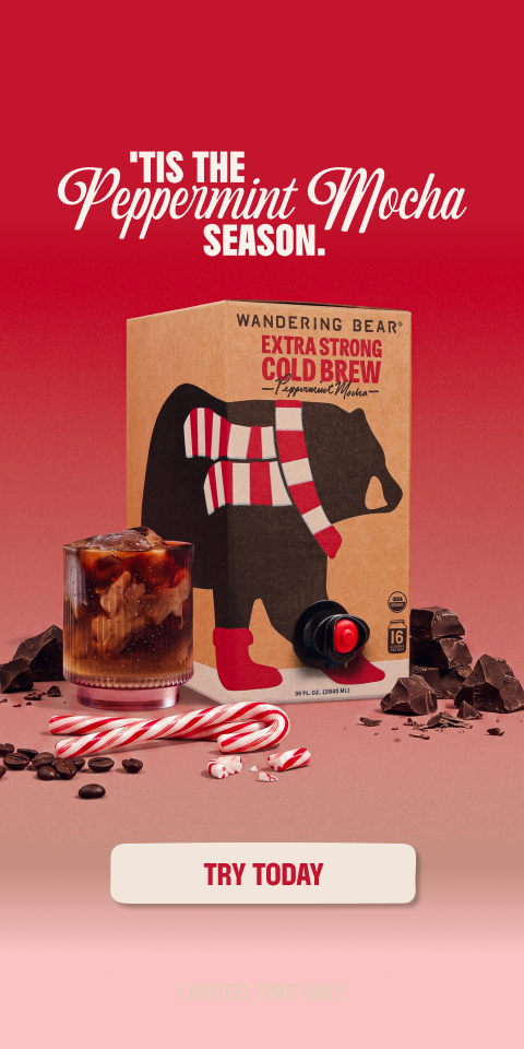 Wandering Bear Extra Strong Cold Brew Peppermint Mocha holiday advertisement with iced coffee, candy canes, and chocolate pieces