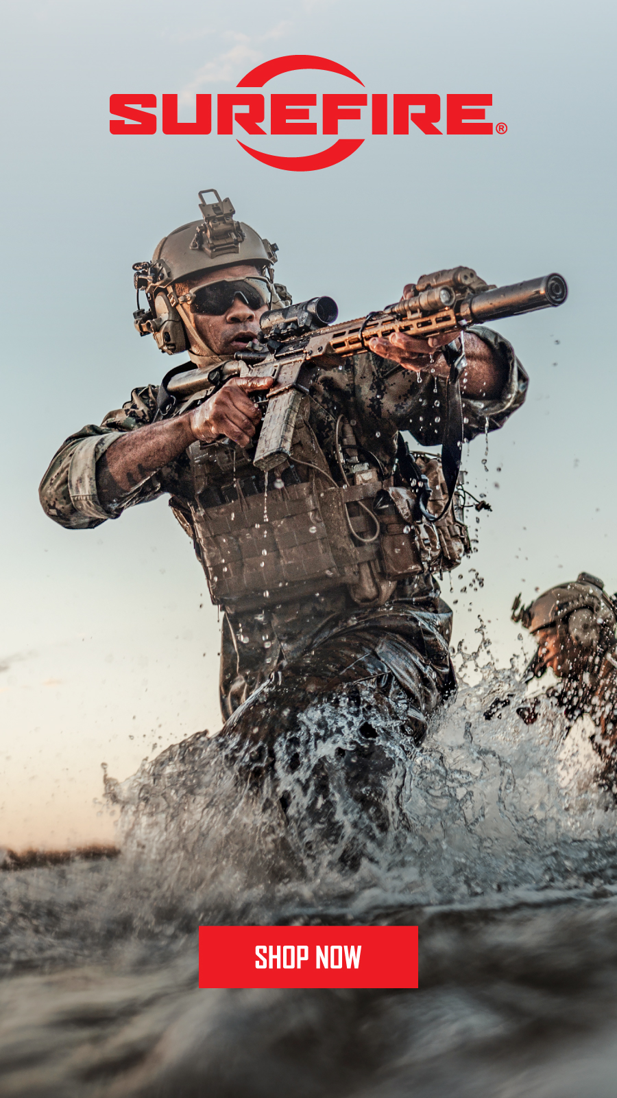 A soldier in tactical gear wading through water, holding a rifle with attached flashlight. "SureFire" logo and "Shop Now" button visible.