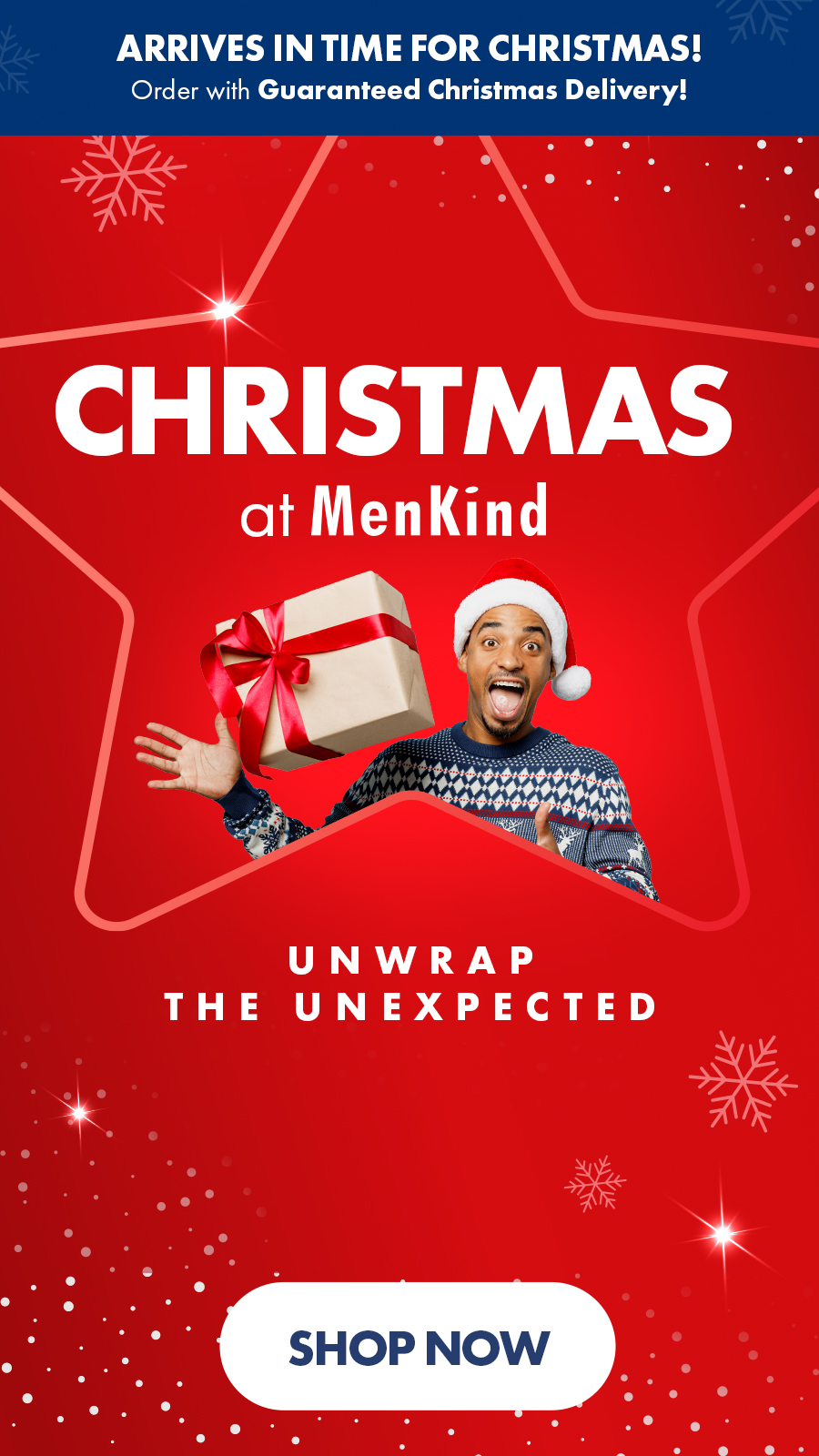 ```html
<img src="image.jpg" alt="Christmas advertisement for MenKind featuring a person in a Santa hat and sweater holding a gift, with the text 'Unwrap the Unexpected' and 'Shop Now' button." />
```